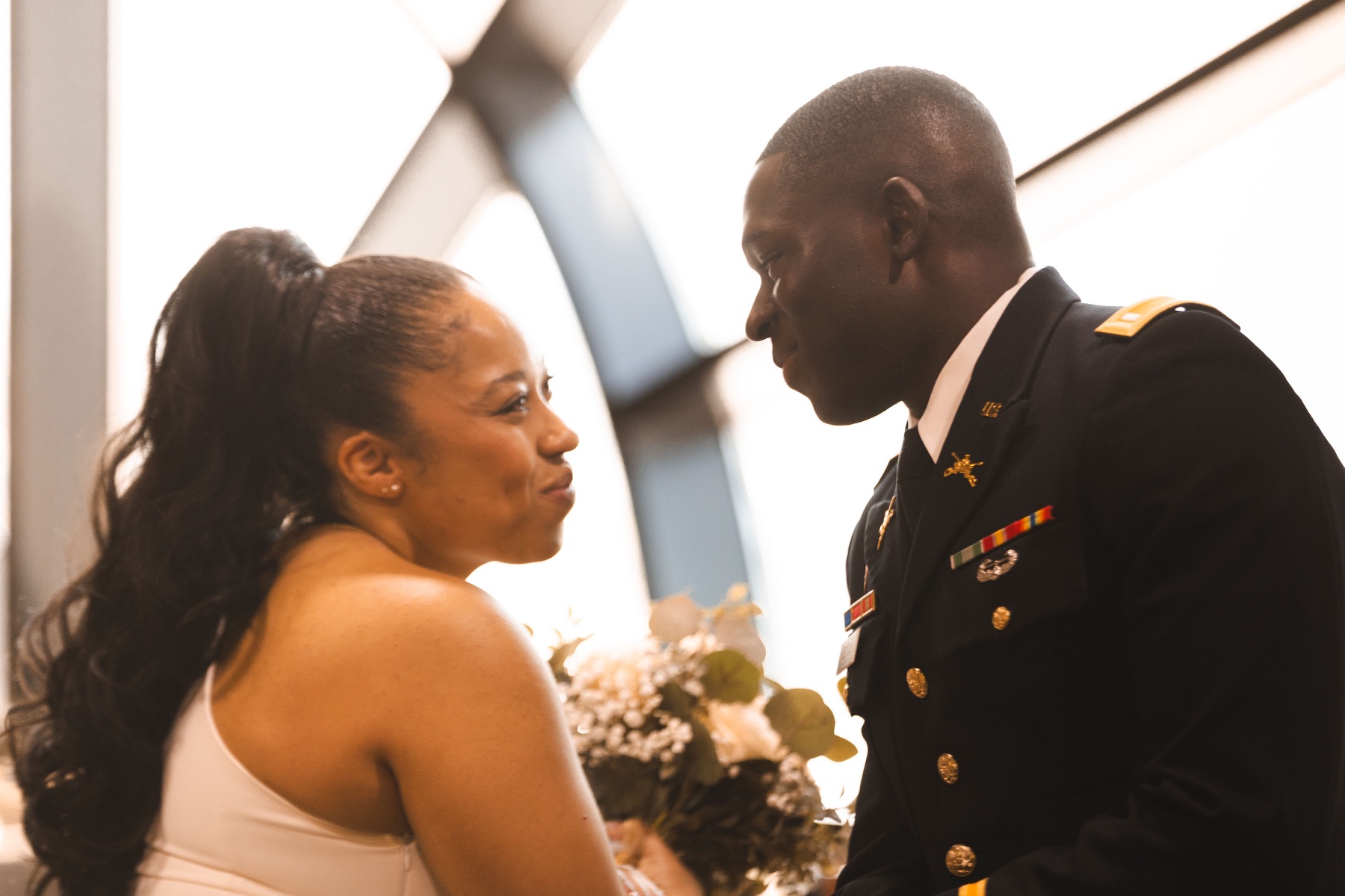 A close portrait of Ayo and Jordin sharing a quiet moment